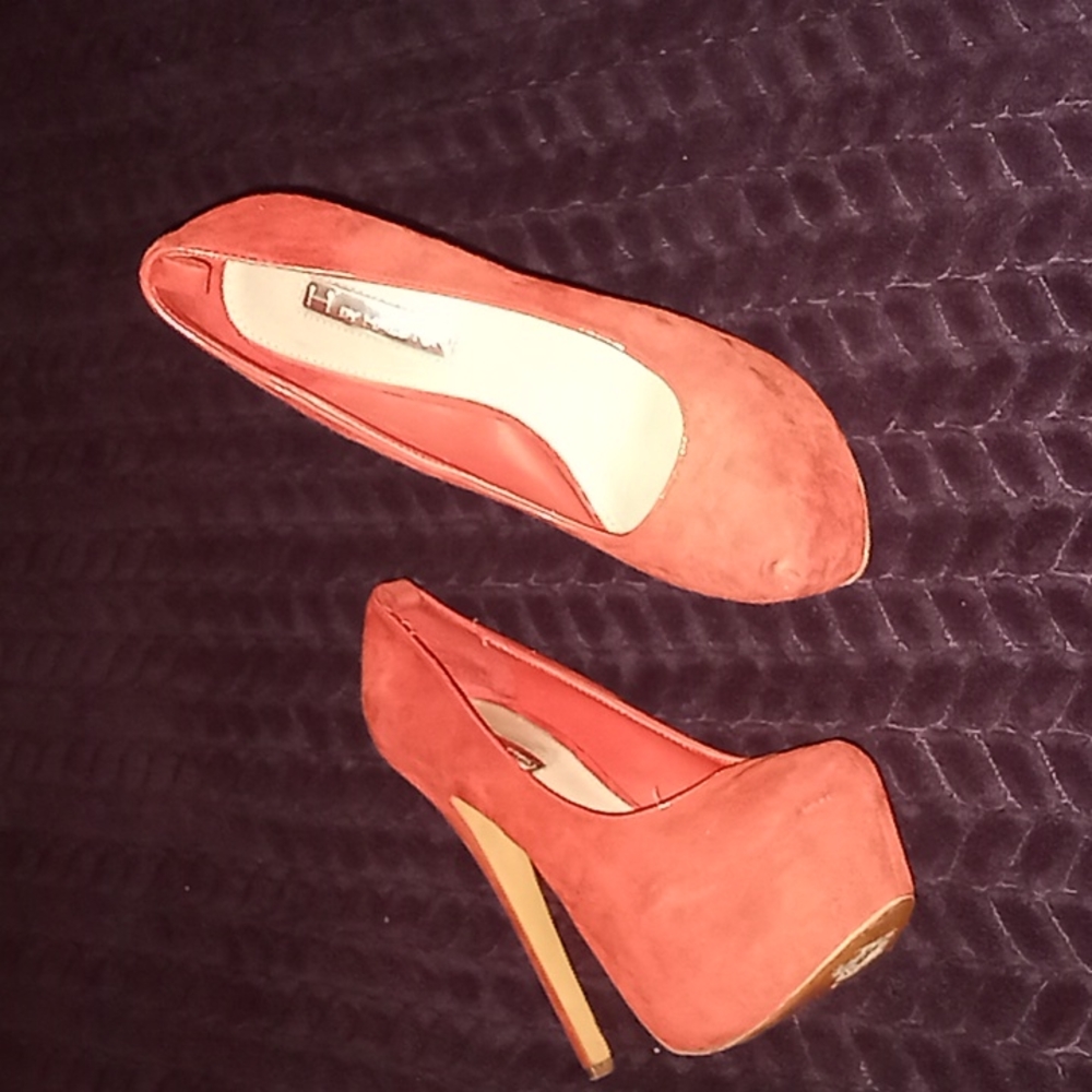 Red high heels by Halston